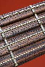 macro image of the strings of a bass guitar