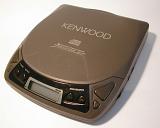 Retro Kenwood personal CD player viewed high angle close up in a technology and entertainment concept with brand label