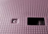 Video cassette plastic case with technical holes - close-up full frame image