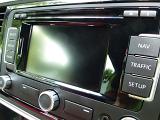 Close up on automobile satelite radio controls with powered down blank black screen