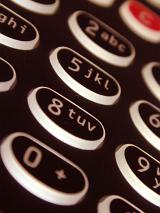 Black alphanumeric keypad with buttons on a close up oblique angle view