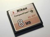 8mb compact flash memory card for photography lying brand side up on a white background in a close up view - editorial use only