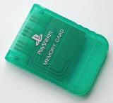 Closeup of green Playstation memory card on white background