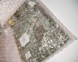 A new computer expansion daughterboard in its bubble wrap packaging
