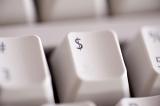 a computer keyboard with a dollar symbol in focus
