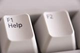 closeup image of the help hey on a computer keyboard