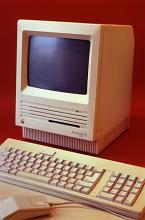 an old classic style apple mac computer