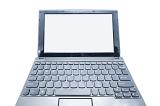 an open netbook computer showing a blank screen with space for text