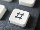 Hash button on a mobile phone keypad with a number sign or pound sign icon, sometimes referred to as the hashtag