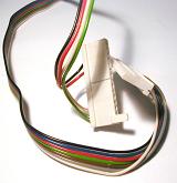 Power cord with multicolored wires disconnected from white plug