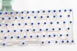 Keyboard flexible membrane circuit on transparent film with blue rubber button dots over white background