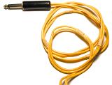 Thick quarter inch yellow audio cord close-up