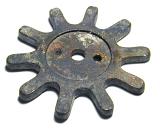 Old corroded vintage toothed gear wheel on a white background viewed high angle