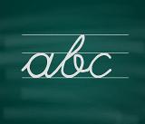Handwritten ABC with white chalk on blackboard