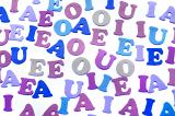 Bunch of colorful letters on white background
