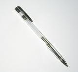 Black ball point pen or roller ball lying diagonally on white with copy space