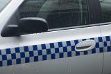Blue and white chequered markings on a police van used as a means of identifying vehicle used in law enforcement