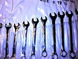 Collection of Combination Spanner Wrenches Arranged by Size in Plastic Packaging
