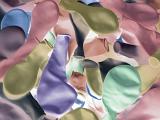 Full frame background of deflated balloons in pink, purple, yellow and green colors