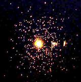 High power telescopic view on cluster galaxy or astronomical explosion over black as background