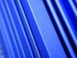 Close up background of blue solid diagonal lines from cabinet or metal casing with copy space