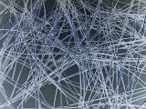 Hundreds of overlapping wires or rods as background for abstract portrayal of technology or confusions