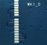Full frame top down view on blue colored electronic test pads with printed circuits