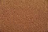 Abstract background composed of an extreme close up view of a brown knitted fabric
