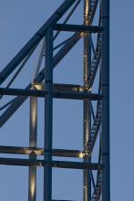 Metal framework of a building spire at twilight in a close up view for structural engineering themes