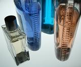 colorful bottles of after shave and other bathroom lotions