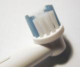close up image on the head of an electric tooth brush