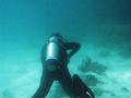 A scuba diver swimming underwater