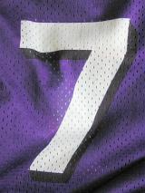 a sports shirt with the number 7 on it